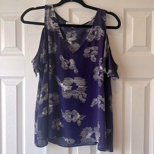 Blue peekaboo shoulder blouse with white flowers